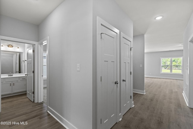 1399 Hammocks Beach Rd, Swansboro, NC 28584 - corridor featuring wood finished floors, baseboards, and recessed lighting