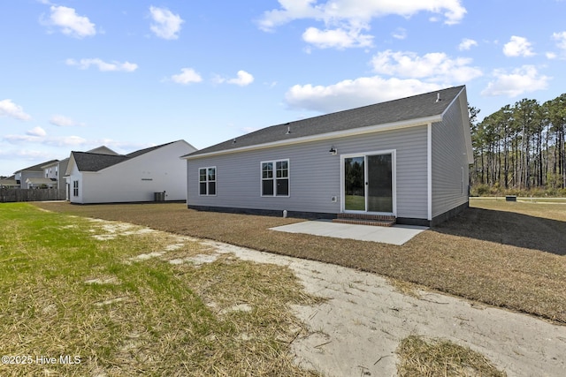 1399 Hammocks Beach Rd, Swansboro, NC 28584 - back of house featuring a patio area and a lawn