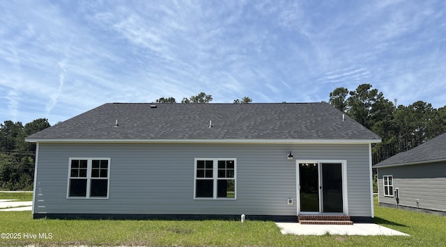 1399 Hammocks Beach Rd, Swansboro, NC 28584 - back of property featuring a lawn