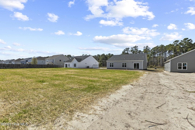 1399 Hammocks Beach Rd, Swansboro, NC 28584 - back of house with a residential view