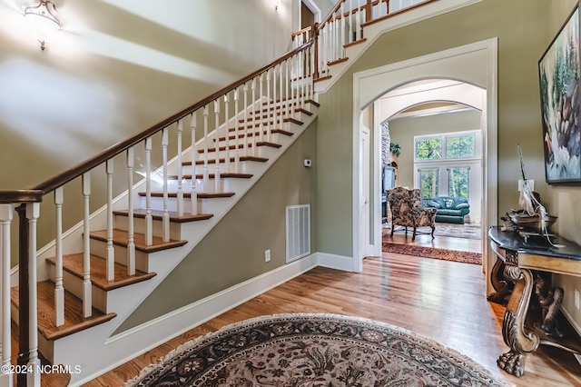 foyer with hardwood / wood-style flooring