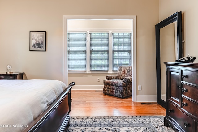 bedroom featuring light hardwood / wood-style floors