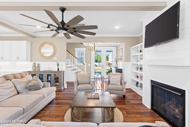 living room with french doors, dark hardwood / wood-style flooring, ceiling fan, and ornamental molding