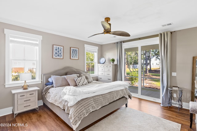 bedroom featuring access to exterior, ceiling fan, dark hardwood / wood-style flooring, and ornamental molding