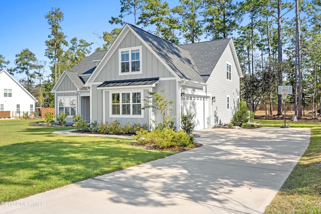 view of front facade featuring a front lawn and a garage