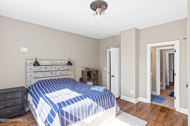 bedroom featuring wood-type flooring