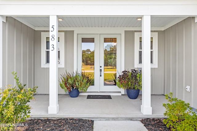 entrance to property featuring french doors