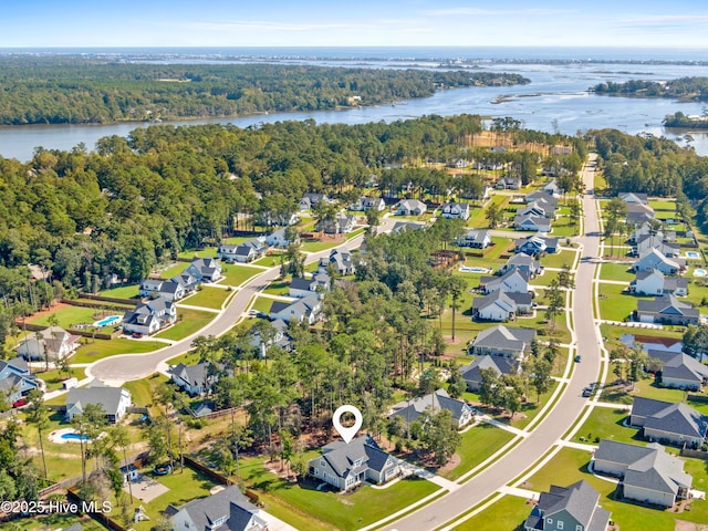 bird's eye view with a water view