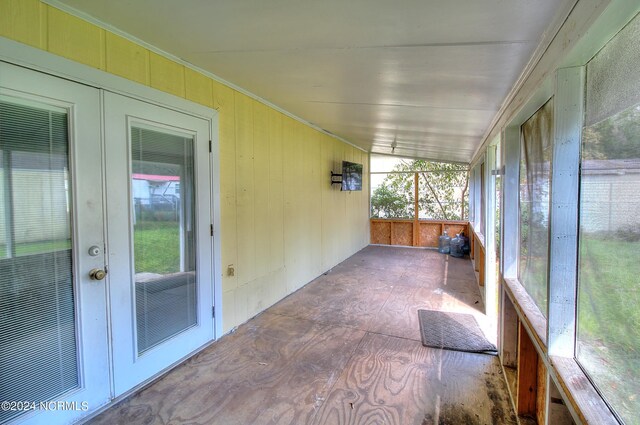 2989 Bird Dr SW, Shallotte, NC 28470 - unfurnished sunroom featuring french doors