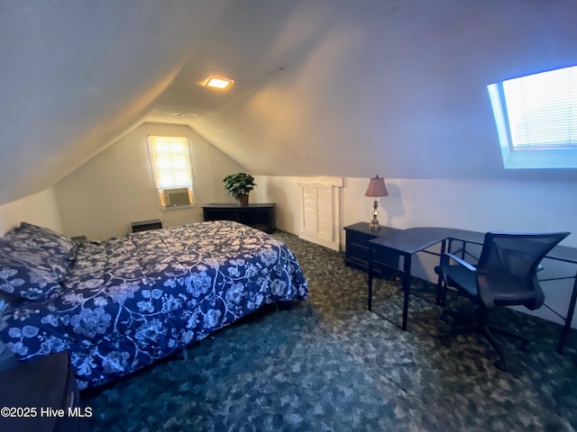 bedroom with carpet, cooling unit, and lofted ceiling