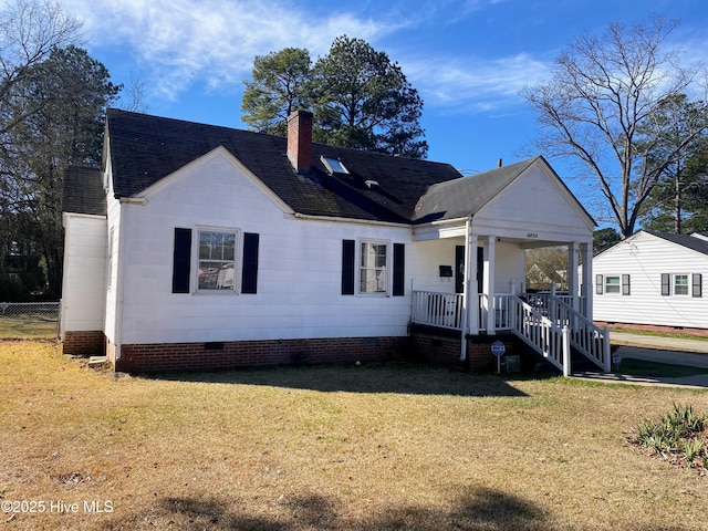 view of front of home with a shingled roof, a chimney, a porch, crawl space, and a front lawn