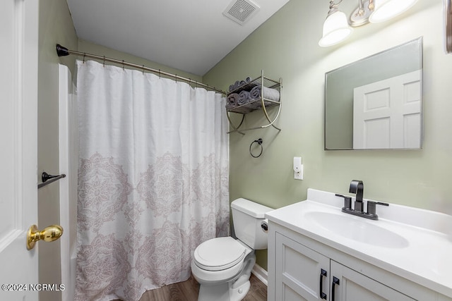 bathroom with vanity, a shower with curtain, wood-type flooring, and toilet