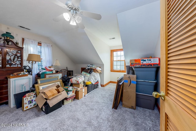 bonus room with vaulted ceiling, carpet flooring, and ceiling fan