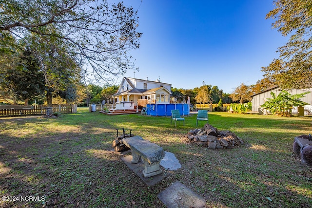 view of yard featuring a deck