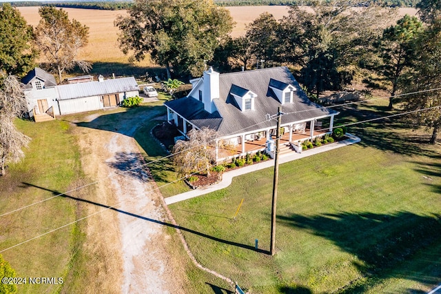 birds eye view of property featuring a rural view