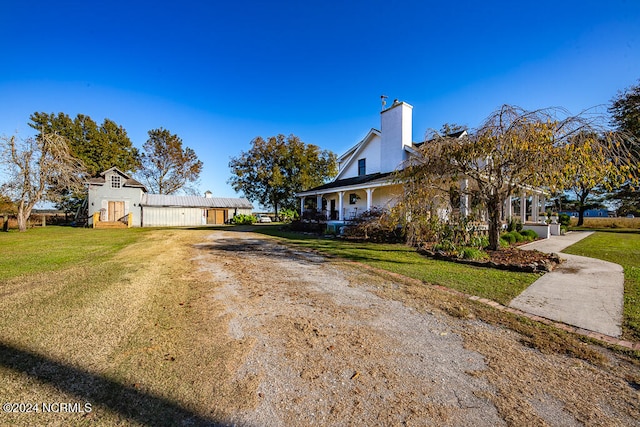 view of property exterior with a lawn