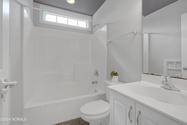 full bathroom with vanity, toilet, tile patterned floors, and shower / bathtub combination