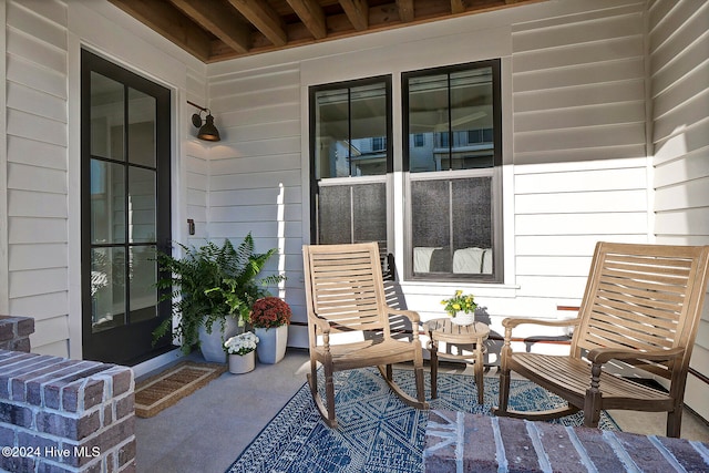 view of patio featuring covered porch