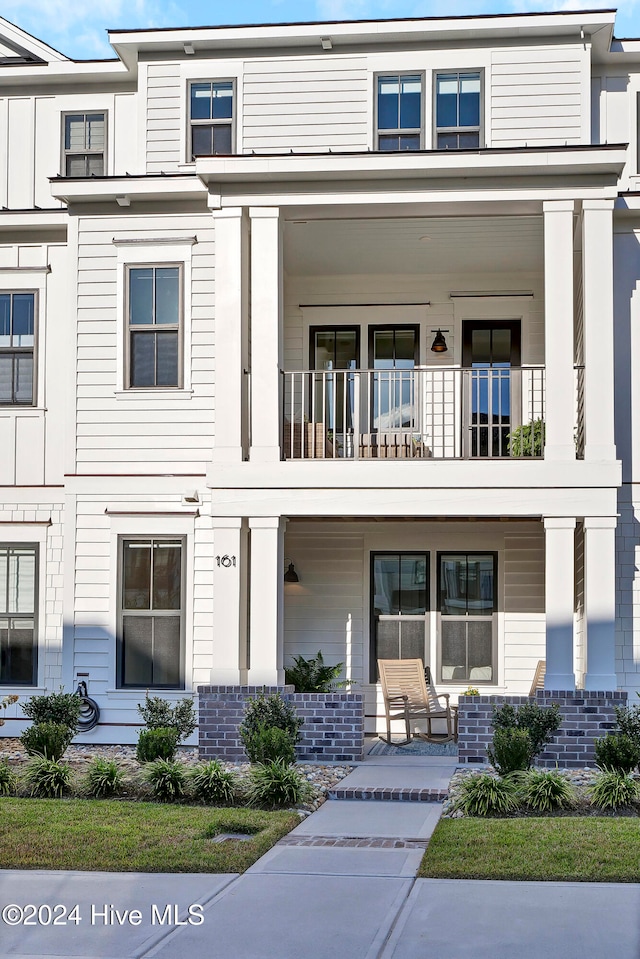 view of property featuring a balcony