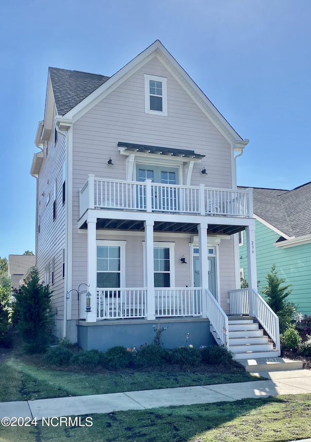 236 Trisail Ter, Wilmington, NC 28412 - view of front of house with covered porch and a balcony