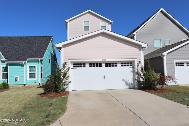 236 Trisail Ter, Wilmington, NC 28412 - traditional-style house with concrete driveway and a front lawn