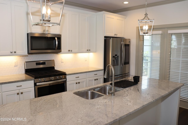 236 Trisail Ter, Wilmington, NC 28412 - kitchen featuring light stone counters, a sink, appliances with stainless steel finishes, and white cabinets
