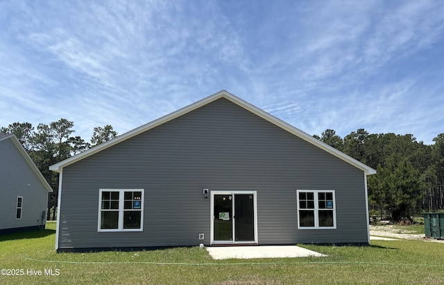 1397 Hammocks Beach Rd, Swansboro, NC 28584 - rear view of property with a yard and a patio