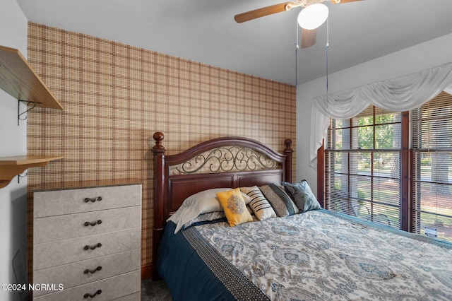 1008 S Howard Cir, Tarboro, NC 27886 - bedroom featuring wallpapered walls and a ceiling fan