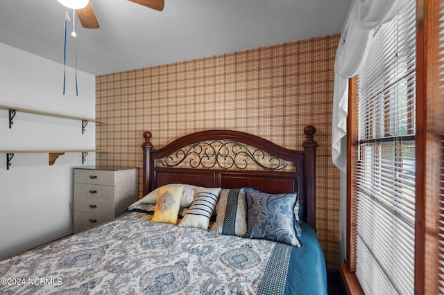 1008 S Howard Cir, Tarboro, NC 27886 - bedroom featuring wallpapered walls and ceiling fan