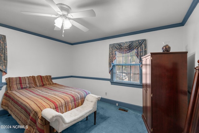 carpeted bedroom featuring crown molding and ceiling fan