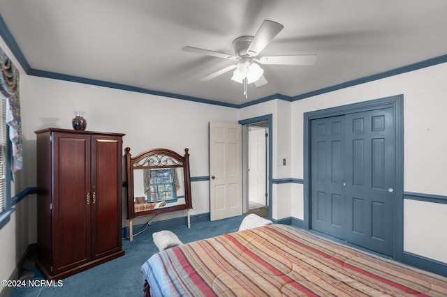 carpeted bedroom with a closet, ceiling fan, and crown molding