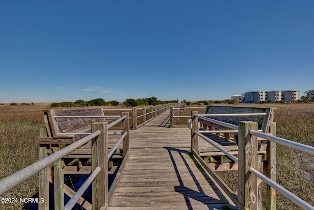 view of dock featuring a rural view