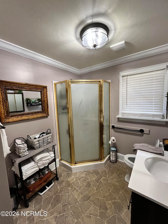 bathroom featuring crown molding, toilet, an enclosed shower, and vanity