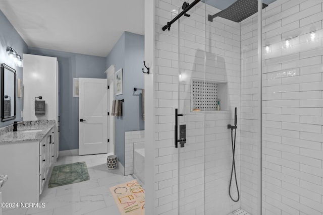 bathroom featuring vanity and plus walk in shower