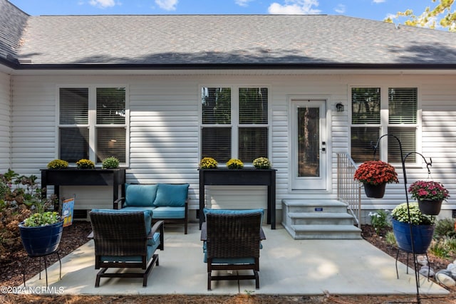 exterior space featuring outdoor lounge area and a patio area