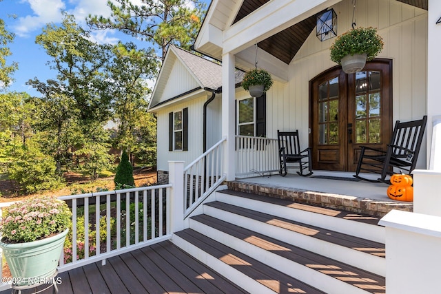 wooden terrace featuring a porch