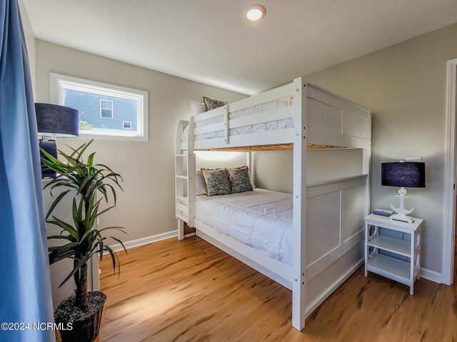 bedroom with light wood-type flooring