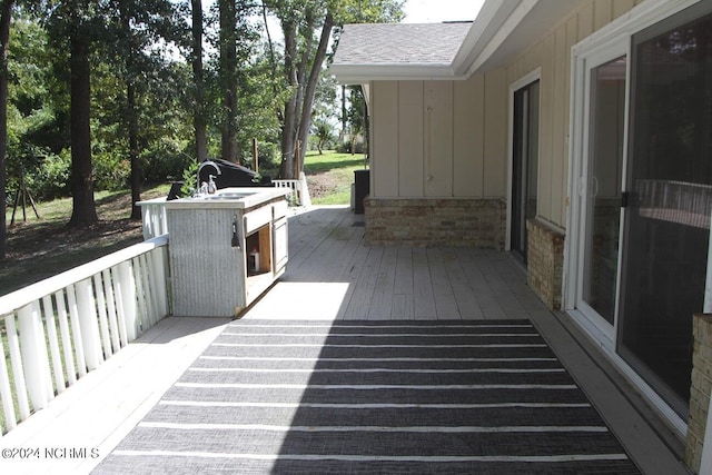 deck featuring sink