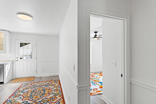 interior space featuring light hardwood / wood-style flooring and ceiling fan