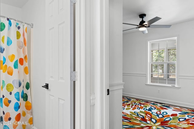 bathroom featuring ceiling fan