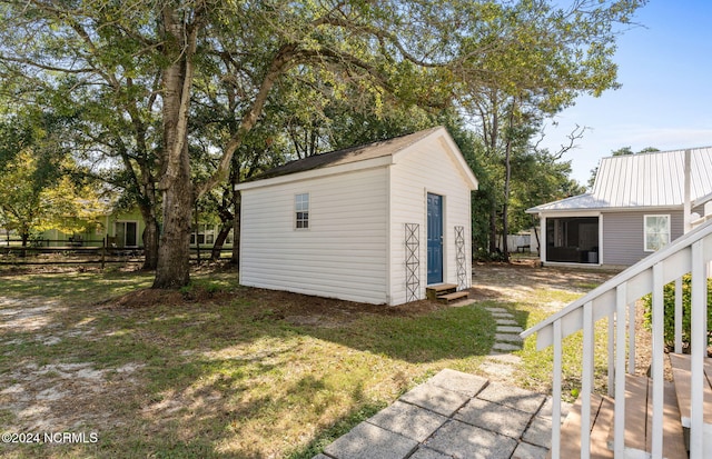160 NE 5th St, Oak Island, NC 28465 - view of outbuilding featuring entry steps