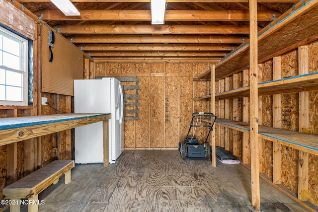 160 NE 5th St, Oak Island, NC 28465 - below grade area with freestanding refrigerator