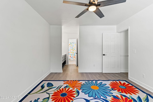 bedroom featuring ceiling fan and light wood-type flooring