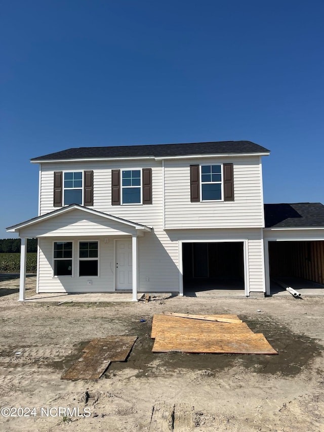 view of front of house with a garage