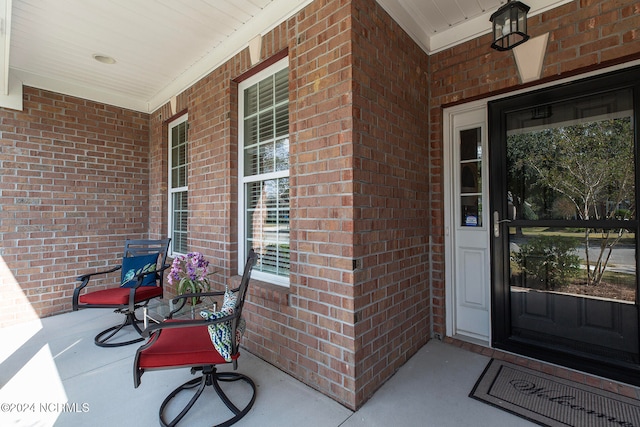 entrance to property with covered porch