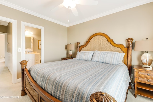 bedroom featuring ornamental molding, ensuite bathroom, and light carpet