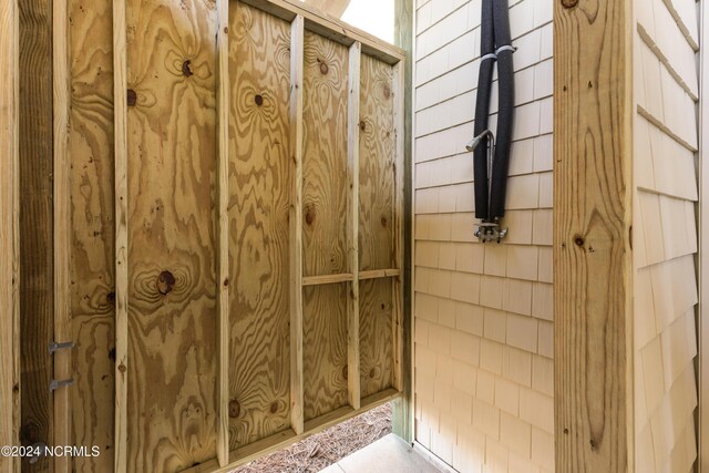 bathroom featuring vanity, toilet, a shower with door, and ceiling fan