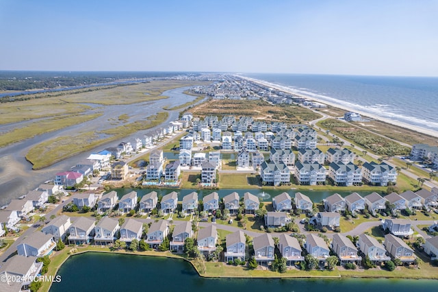 birds eye view of property featuring a residential view and a water view