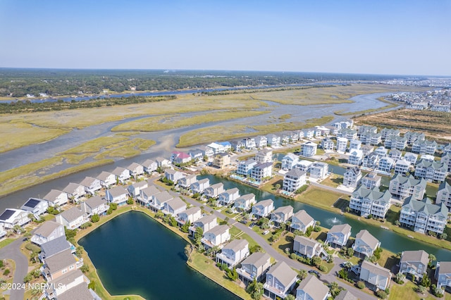 aerial view featuring a residential view and a water view