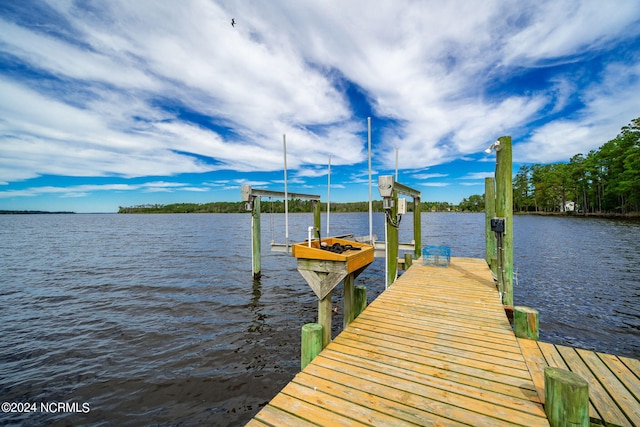 view of dock with a water view